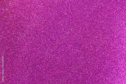  Bright purple shiny background with sparkles.