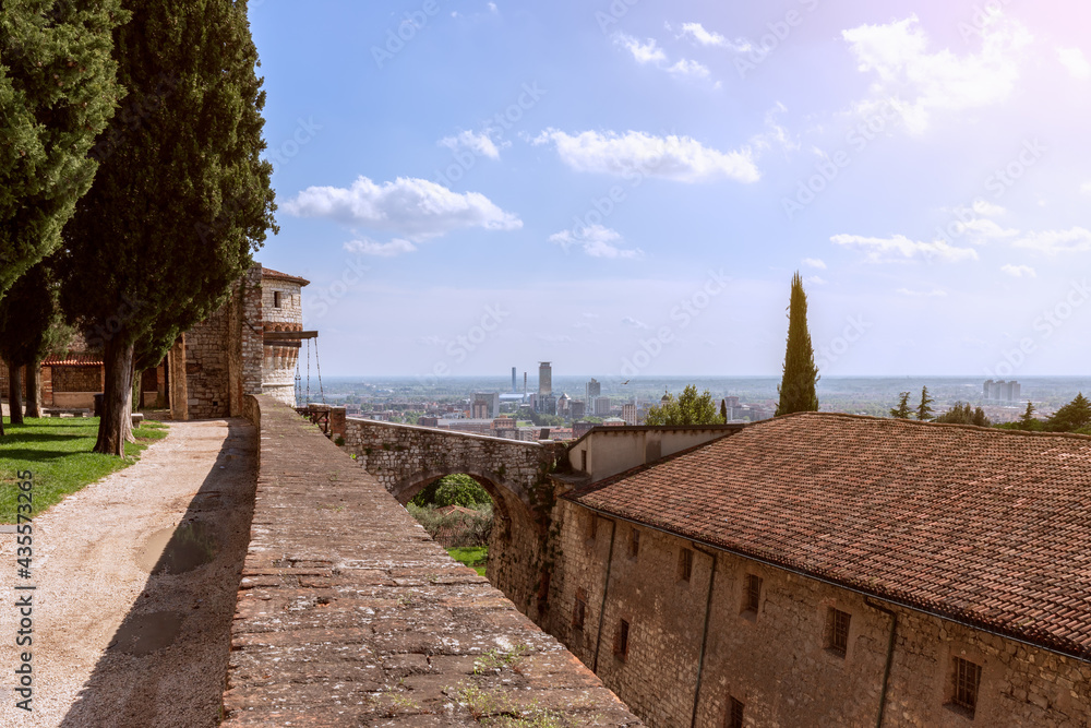 View from the castle to the arch of the drawbridge and the center of Brescia. Lombardy, Italy View from the castle to the arch of the drawbridge and the center of Brescia. Lombardy, Italy