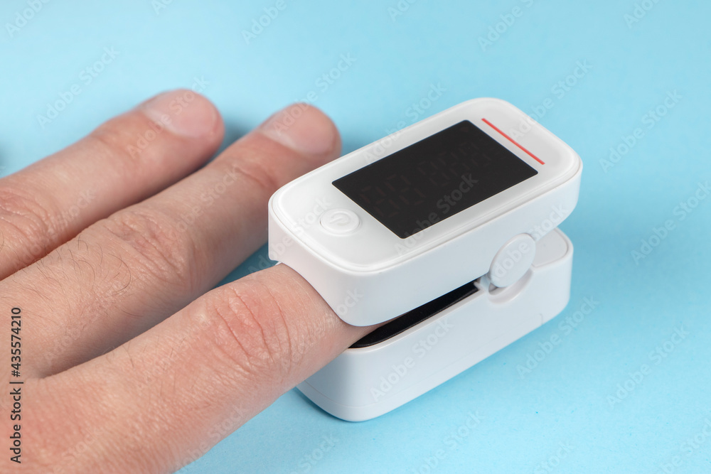 A pulse oximeter used to measure pulse rate and oxygen levels A pulse oximeter used to measure pulse rate and oxygen levels