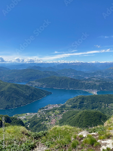 Panorama View from Top of Monte Genereso, Ticino, Switzerland. View to Lugano city, San Salvatore mountain and Lugano lake. © TonzTonz