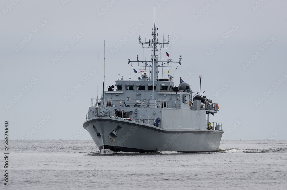 WARSHIP - Estonian minehunter swimming on sea WARSHIP - Estonian minehunter swimming on sea