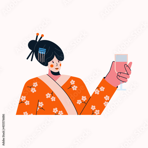 Portrait of woman in traditional geisha costume raising glass