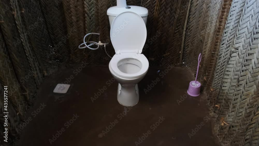 Video „Toilet in an African grass hut, Zanzibar. Bathroom in a small
