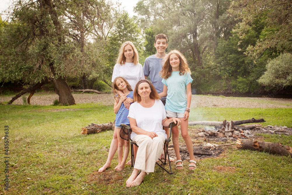 Portrait of a grandmother with grandchildren Portrait of a grandmother with grandchildren