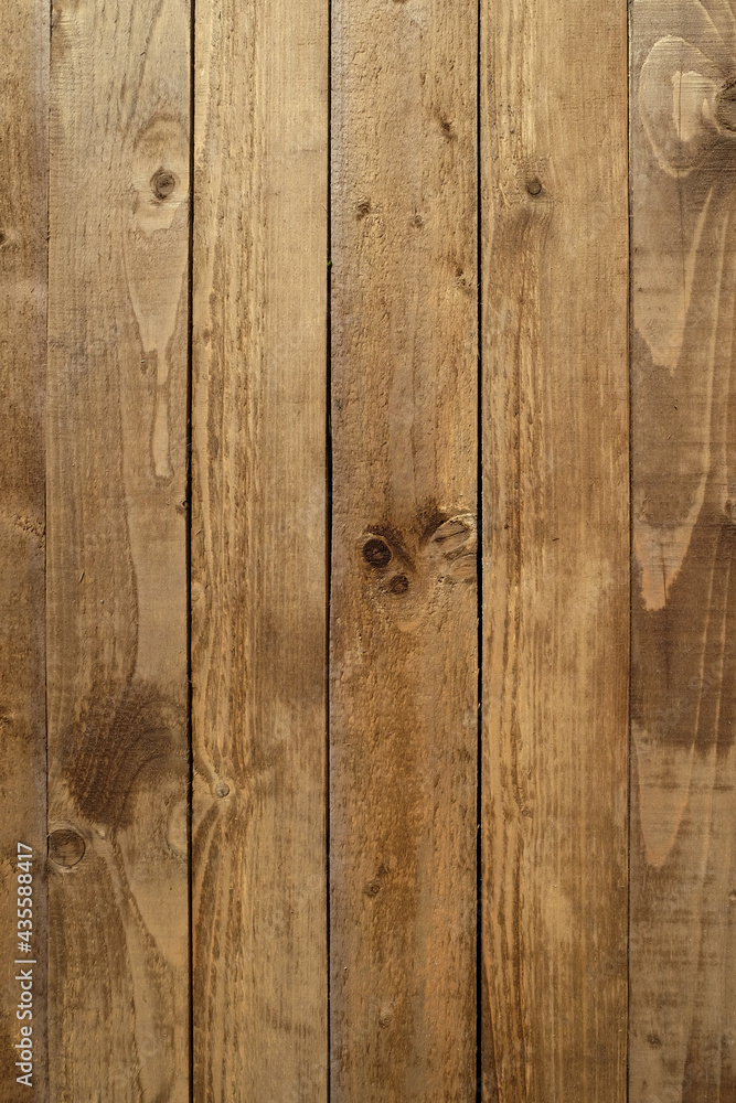 Fototapeta premium Retro style vintage brown painted wooden textured boards as background front view vertical close-up