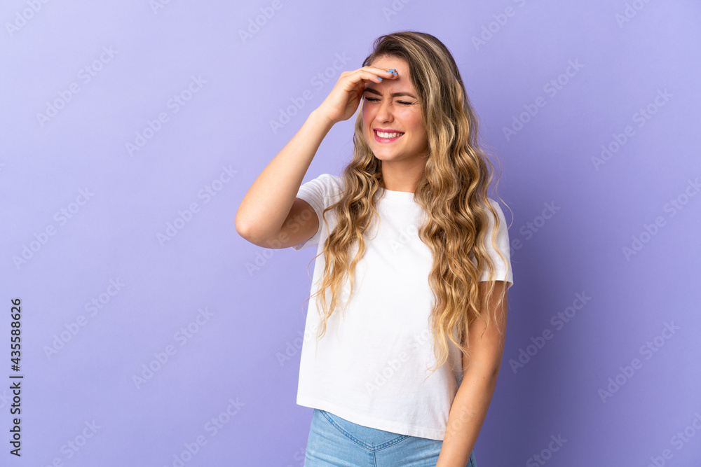 Young Brazilian woman isolated on purple background laughing
