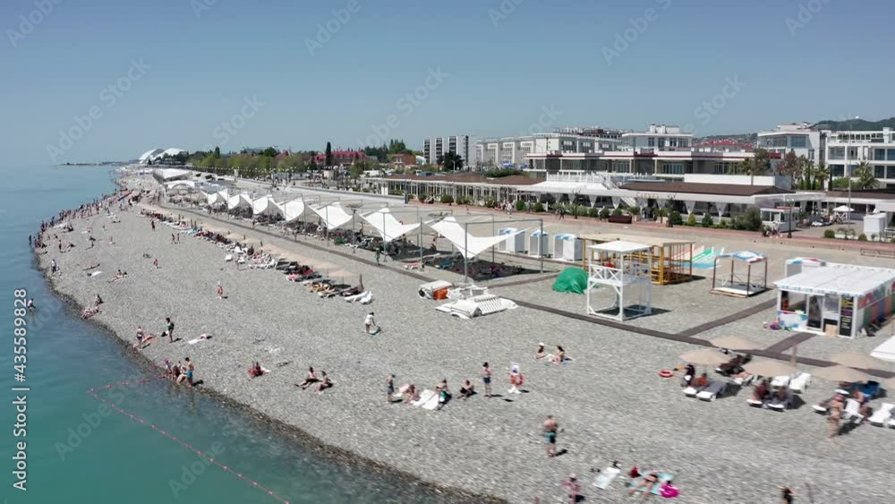 High angle view aerial view. Scene of Beach sea and city at coastal in sunny summer day mountain and sky background. Sochi, Russia