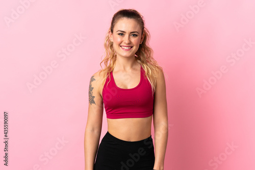Young Brazilian woman isolated on pink background happy and smiling