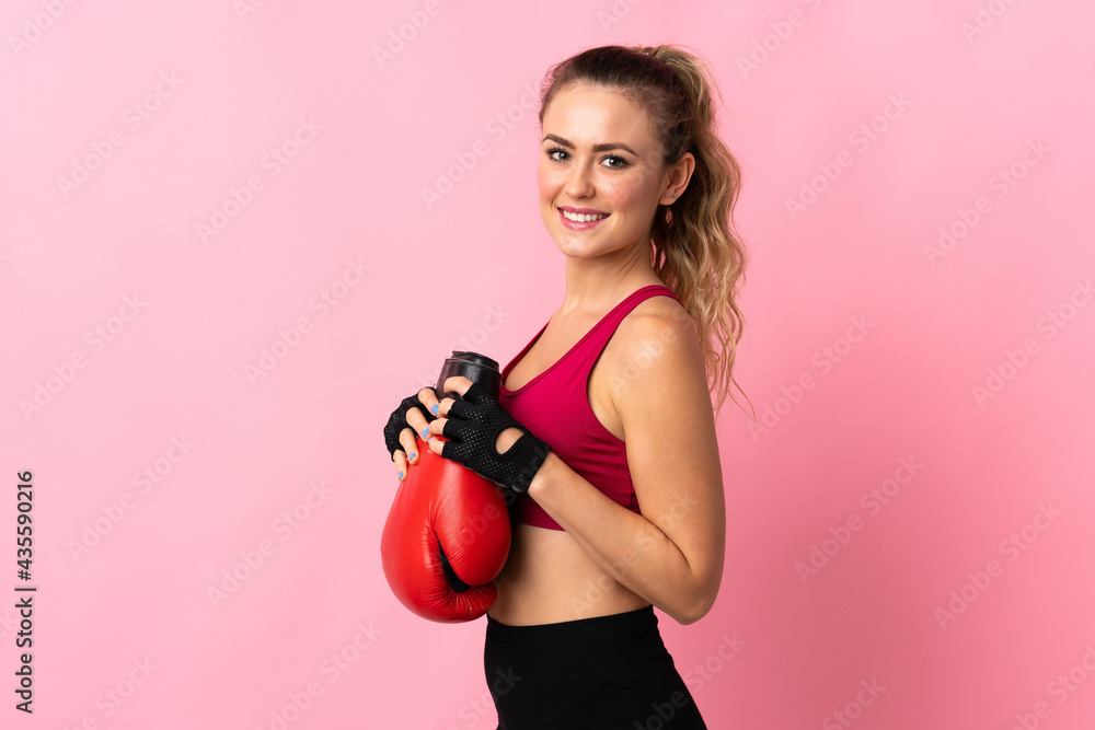 Young Brazilian woman isolated on pink background with boxing gloves Young Brazilian woman isolated on pink background with boxing gloves