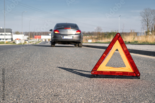 Car accident triangle. Auto vehicle broken down on road. Motor car problem concept.