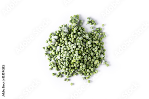 Frozen green peas isolated on white background. Top view