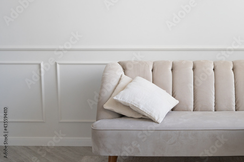 Fototapeta Naklejka Na Ścianę i Meble -  Light vintage sofa in a light interior