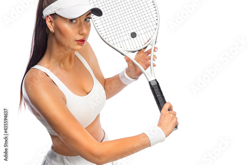 Tennis player with racket in white costume. Woman athlete playing isolated on white background. © Mike Orlov