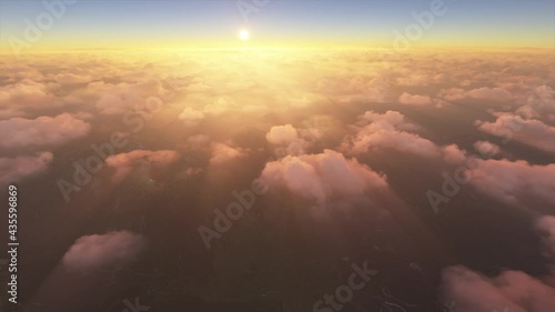 View of fog from above: Low-level clouds over mountains causing fog on the ground. Sun rays are more visible.