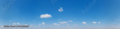 Fototapeta Naklejka Na Ścianę i Meble -  Blue Sky background with tiny Clouds. Panorama background