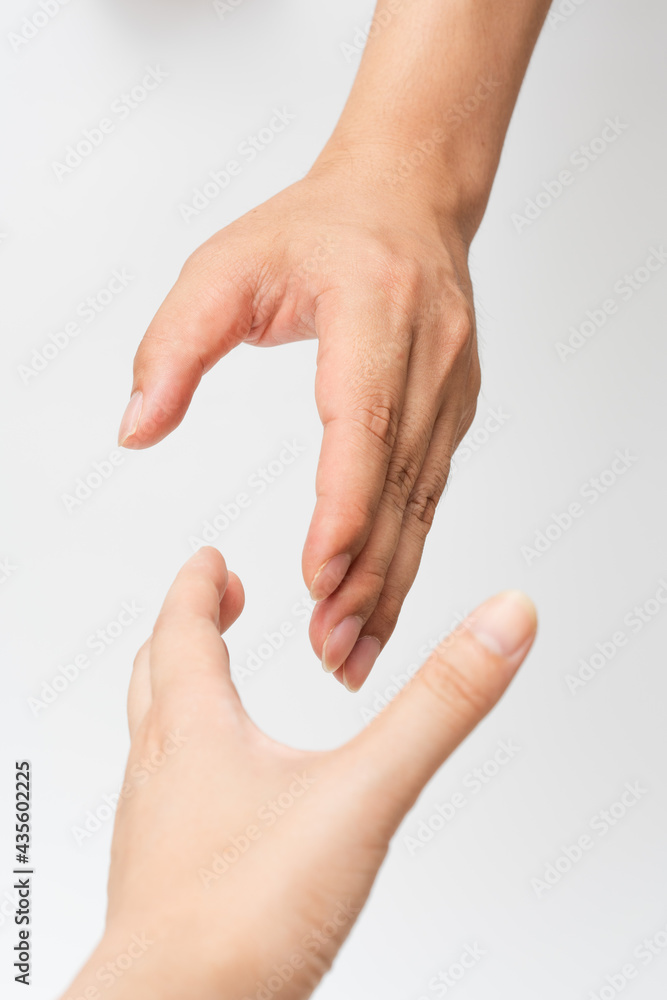 Close up of handshake on white background