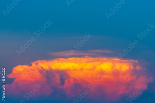 Orange clouds on a blue background