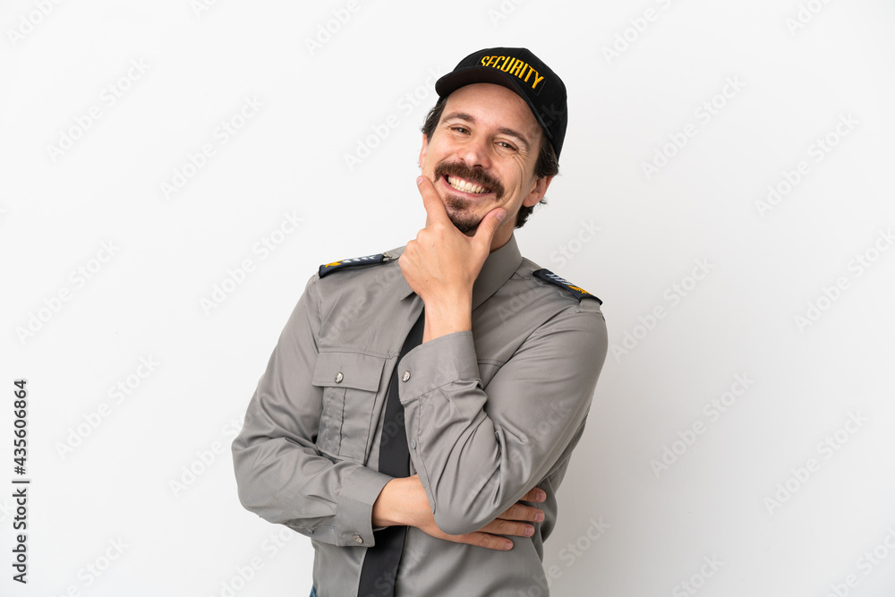 Young caucasian security man isolated on white background smiling Young caucasian security man isolated on white background smiling