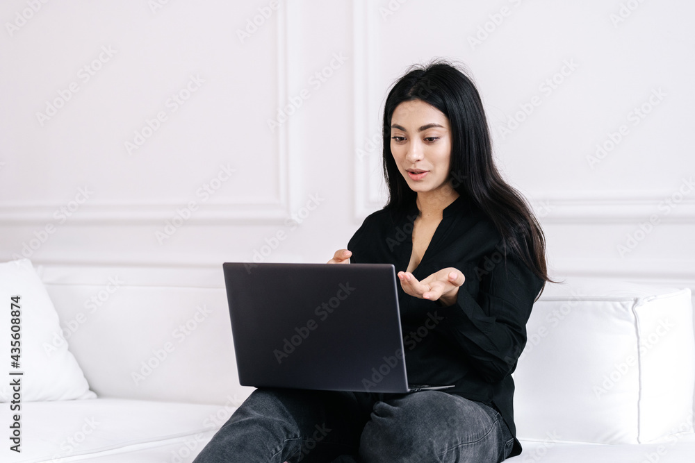 Female freelancer having online meeting at home Female freelancer having online meeting at home