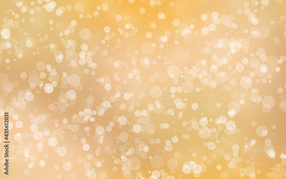 Abstract christmas background with bokeh circle pattern on gold- yellow coloured.