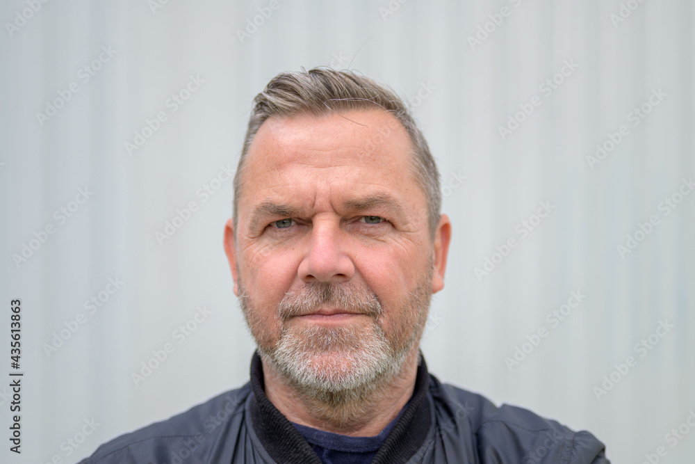 Obraz premium Sincere middle-aged man looking at camera with empathy