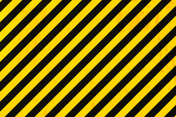 Grunge yellow and black diagonal stripes. Industrial warning background, warn caution, construction, safety