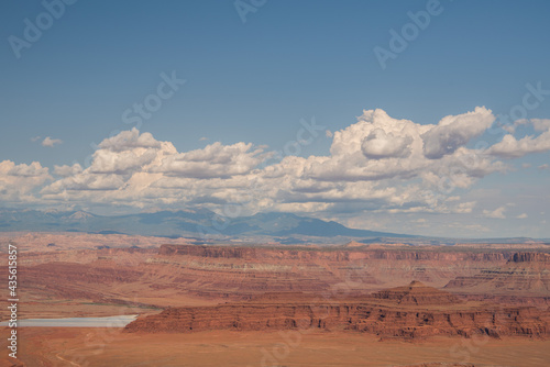 Vast view of Canyonlands National Park with gorgeous sky and layers of red rock canyon.