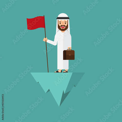 Arabic Business man standing with flag on top of the hill