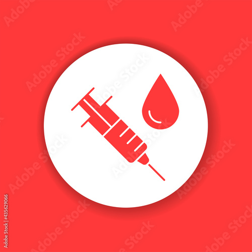 Syringe for injection vaccine with blood color glyph icon.