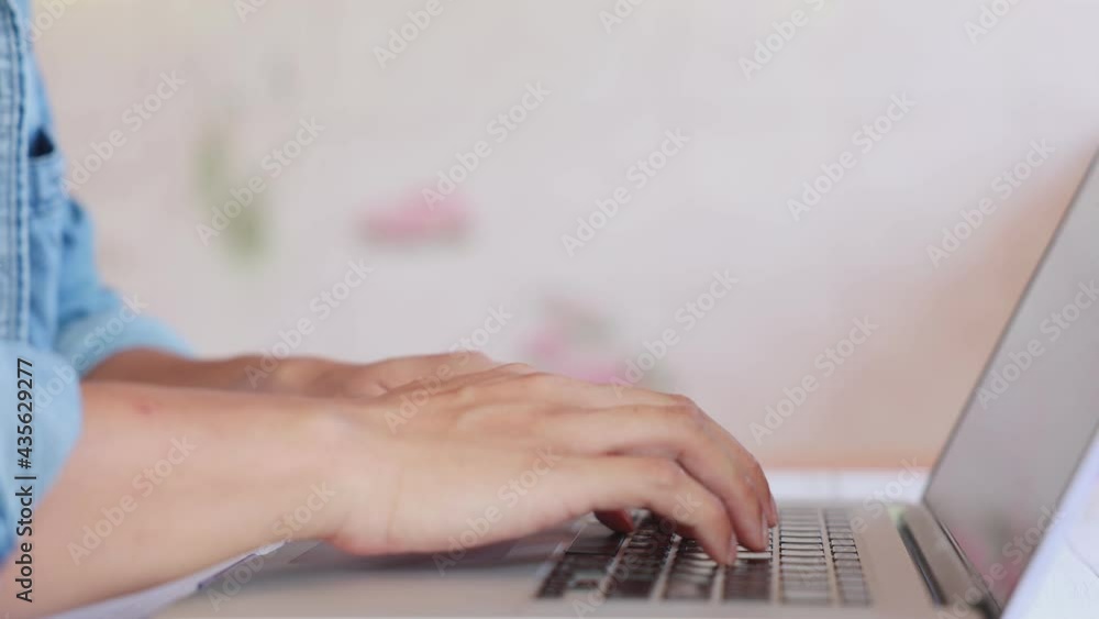Mature man hands typing on notebook keyboard in slow motion. Closeup unrecognizable businessman working on laptop at a remote office. Successful businessman browsing the internet on laptop computer at Mature man hands typing on notebook keyboard in slow motion. Closeup unrecognizable businessman working on laptop at a remote office. Successful businessman browsing the internet on laptop computer at