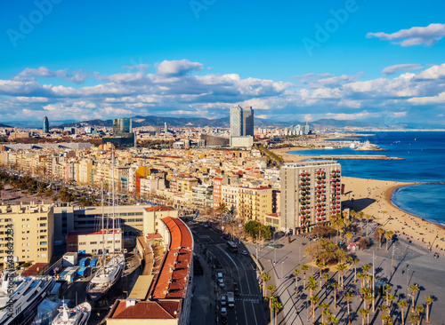 Cityscape with the coastline and Barceloneta Beach, elevated view, Barcelona, Catalonia photo