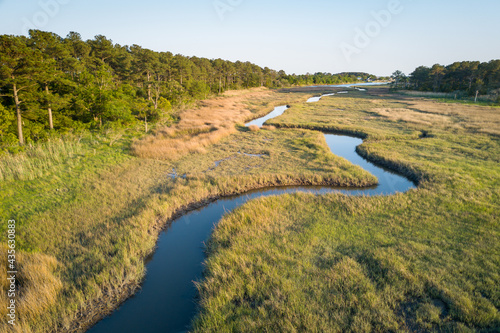 Winding creek through Chesapeake Bay salt water marsh near Hampton, Virginia photo