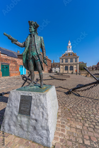 View of the Customs House and statue of George Vancouver, Purfleet Quay, Kings Lynn, Norfolk, England, United Kingdom photo