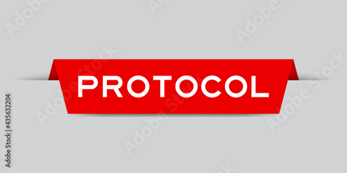 Red color inserted label with word protocol on gray background