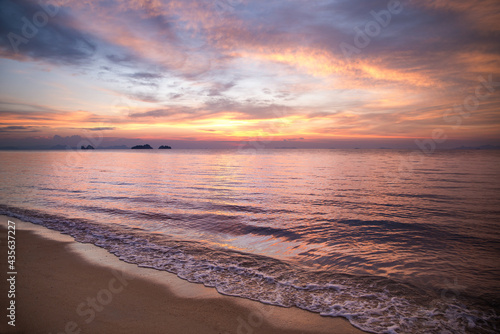 Beautiful sea view landscape with dramatic sunset cloud sky. © jutaphoto