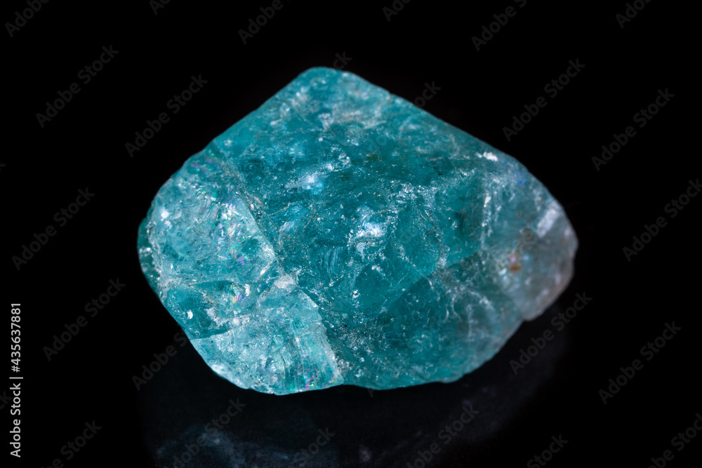 Macro mineral stone apatite on black background Macro mineral stone apatite on black background