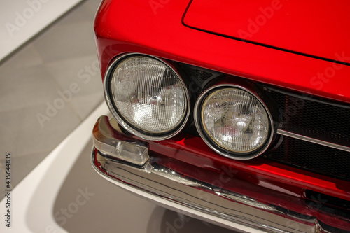 Dual headlights of an old sports car