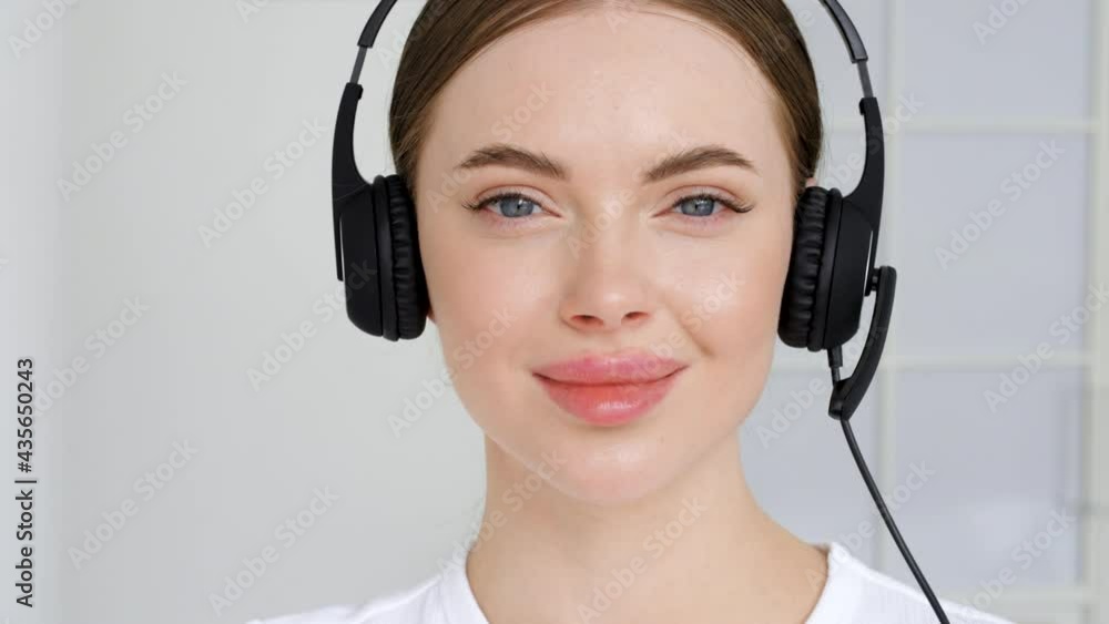Call center operator woman close up face portrait headsethsppy smile model Call center operator woman close up face portrait headsethsppy smile model