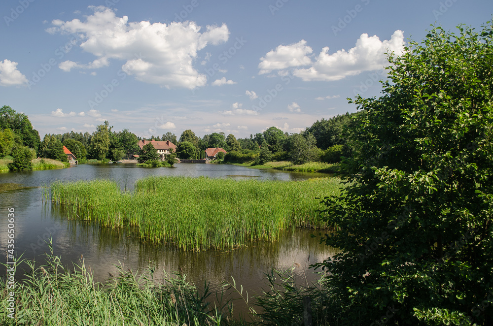 Fototapeta premium Beautiful house and reflection in water. 