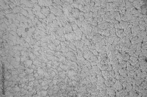Rough painted surface texture of gray color.