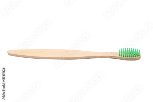 Bamboo toothbrush isolated on a white background.