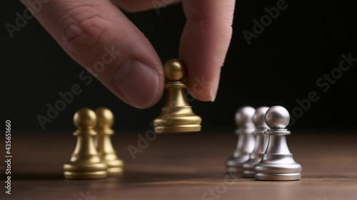 The concept of rivalry and struggle in the form of chess pieces.