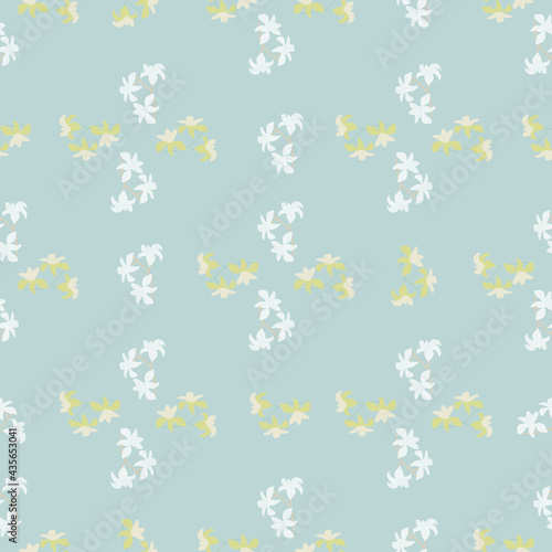 Abstract nature hand drawn seamless pattern with doodle tropic flowers shapes. Pastel blue background.
