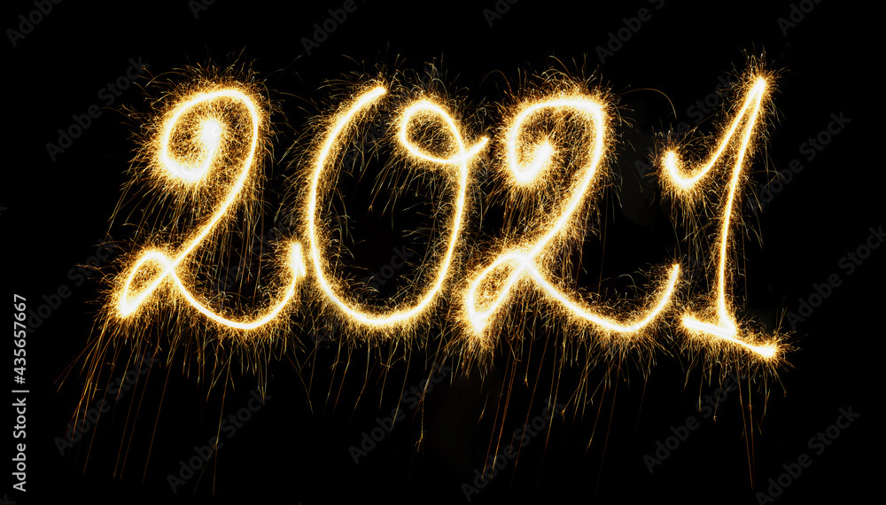 Sparkling Year 2021 painted with sparkles. Written on a deep black background. Sparkling Year 2021 painted with sparkles. Written on a deep black background.