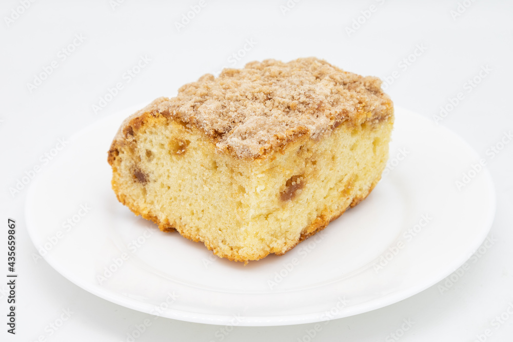 Simple Slice of Coffee Cake on a White Plate Simple Slice of Coffee Cake on a White Plate