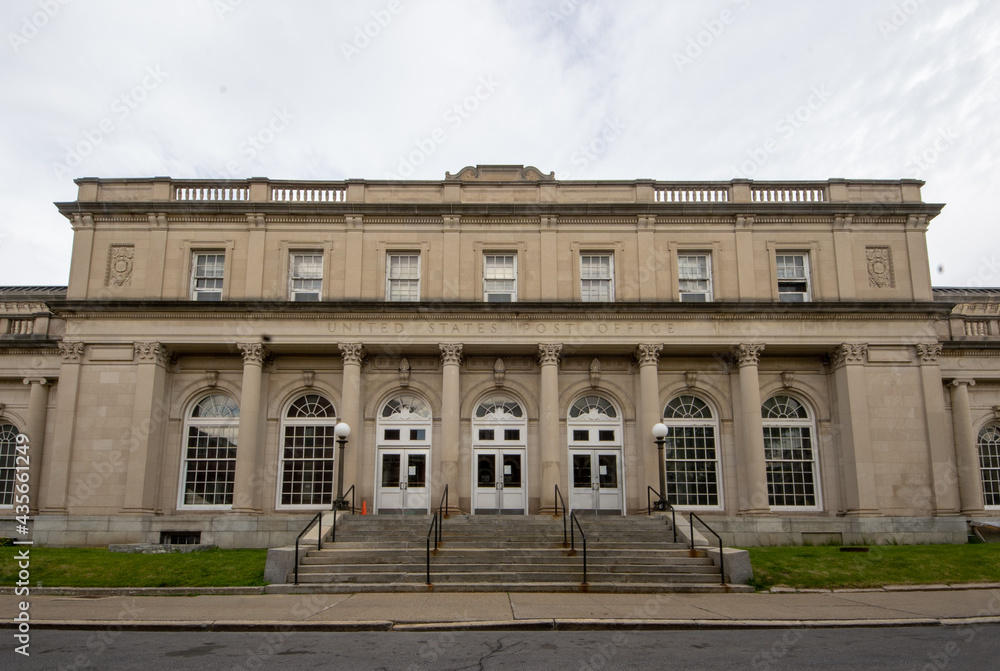 Schenectady, NY - USA - May 22, 2021: a landscape view of United States Post Office on Jay Street. is a brick Classical Revival building erected in 1912 and added onto extensively in 1933