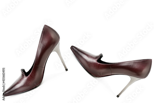 Pair of elegant high heel shoes isolated on white.