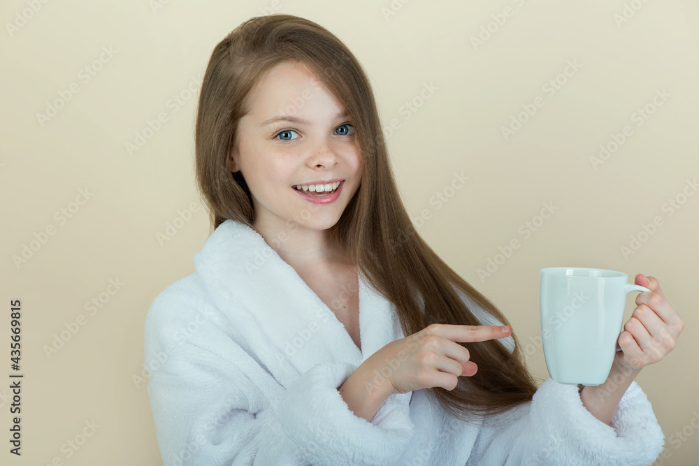 Little girl with white cup