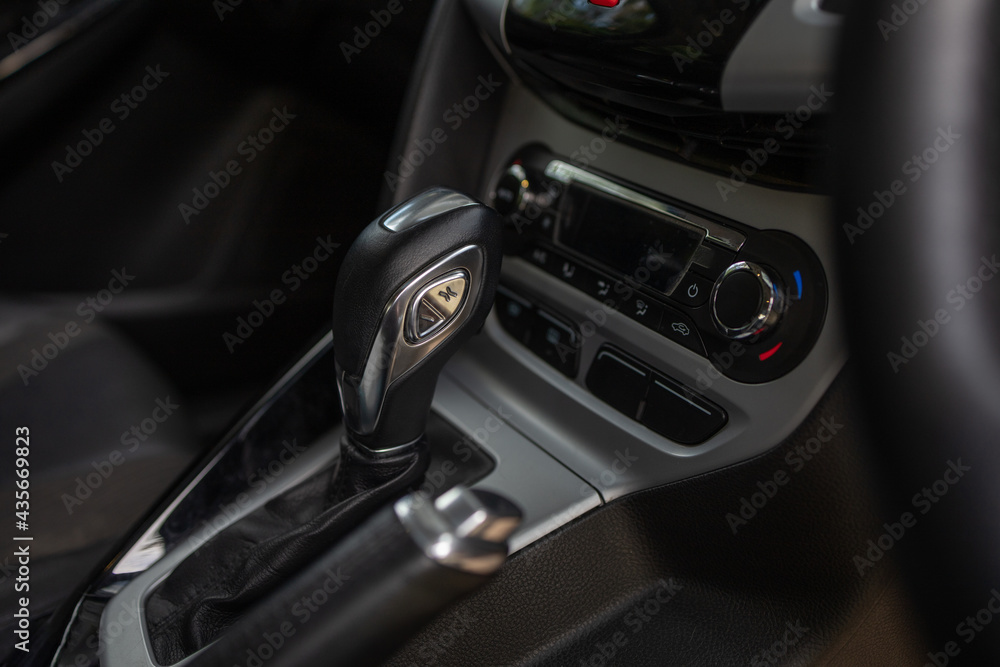 Automatic gear stick of a modern car, Automatic transmission Gear shift . Details and part of car Interior.