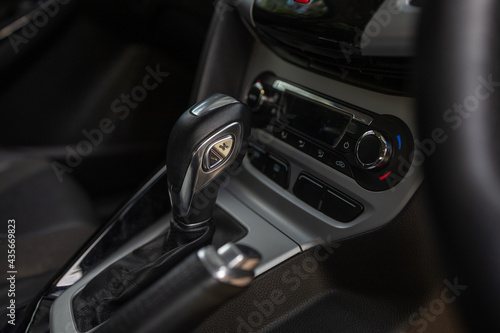 Automatic gear stick of a modern car, Automatic transmission Gear shift . Details and part of car Interior.